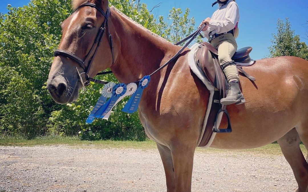 Young rider, Madison riding Daisy the Mule